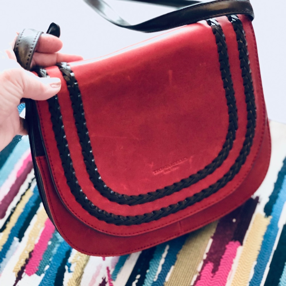 Tignello leather braided crossbody bag.